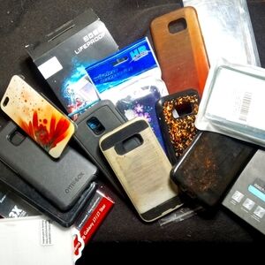 Cell phone Bundle. Includes cases and screen protectors.